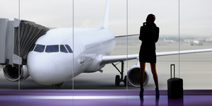 Silhouette of woman at the airport