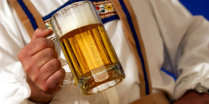 Man holding mug of beer