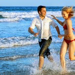 couple enjoying themselves on the beach