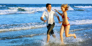 couple enjoying themselves on the beach