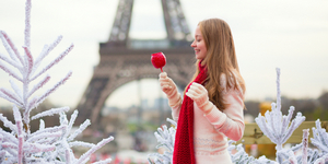Girl with caramel apple in Paris