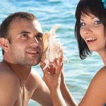Young couple with seashell