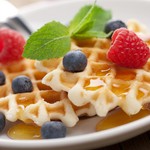 Waffles with fresh berries and honey